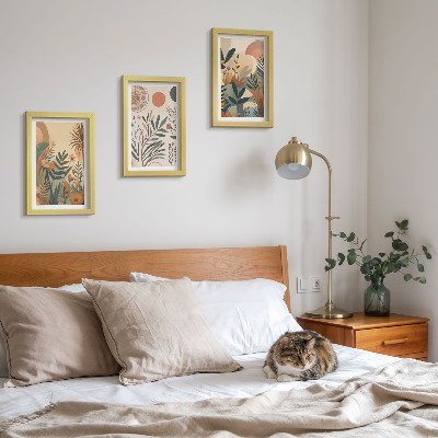 Gallery wall Plantmotieven in gedempte kleuren met cirkels.