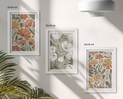 Set van ingelijste schilderijen Bloemmotieven in oranje en groene tinten.
