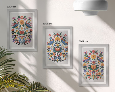 Set van ingelijste schilderijen Bloemmotieven in intense kleuren op een witte achtergrond.