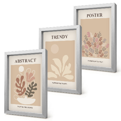 Set van ingelijste schilderijen Posters met plantmotieven in beige en bruine tinten.
