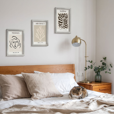 Gallery wall Illustraties van gezichten en bladeren uit de grafische werken van Henri Matisse.