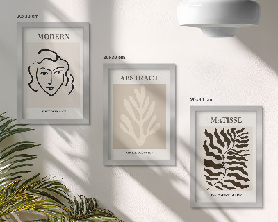 Gallery wall Illustraties van gezichten en bladeren uit de grafische werken van Henri Matisse.