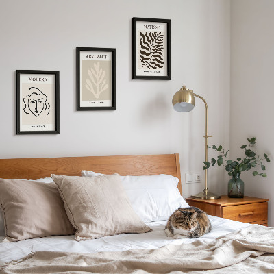 Gallery wall Illustraties van gezichten en bladeren uit de grafische werken van Henri Matisse.
