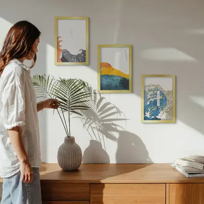 Set van ingelijste schilderijen met golven in Japanse grafische stijl