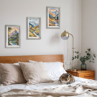 Gallery wall Een berglandschap met een rivier en huisjes in herfstkleuren.