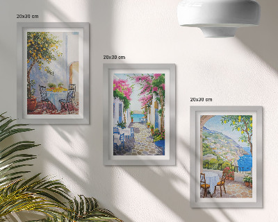 Gallery wall Sfeervolle straatjes met bloeiende planten en uitzicht op zee.