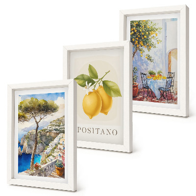 Set van ingelijste schilderijen Uitzicht op Positano met citroenbomen in de zon.