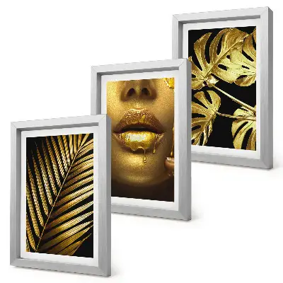 Gallery wall met palmbladeren, een vrouwengezicht en monsterabladeren