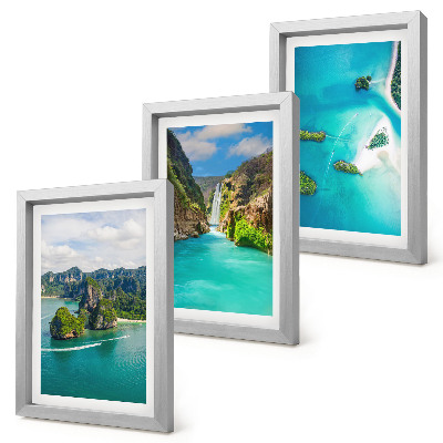 Set van ingelijste schilderijen Tropische landschappen met eilanden en turquoise water.