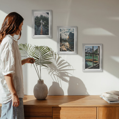Gallery wall Brug in het bosmeer met boten en uitzicht op de bergen