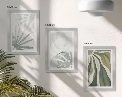 Set ingelijste schilderijen met plantenbladeren in groene en grijze tinten