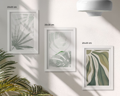 Set van ingelijste schilderijen Plantenbladeren in groene en grijze tinten.