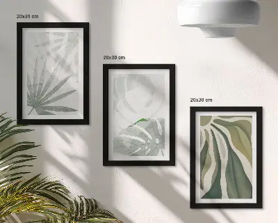 Set ingelijste schilderijen met plantenbladeren in groene en grijze tinten