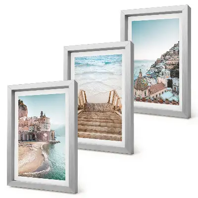 Set ingelijste schilderijen met zomerse pastelkleuren van architectuur aan zee en strand
