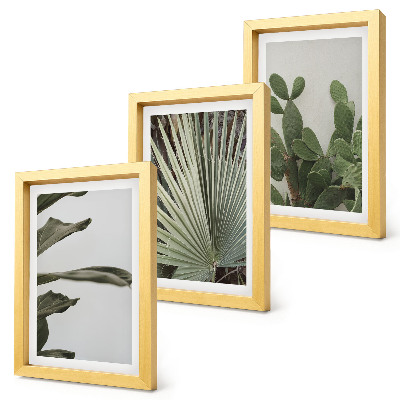 Gallery wall Bladeren van tropische planten in pastelkleuren