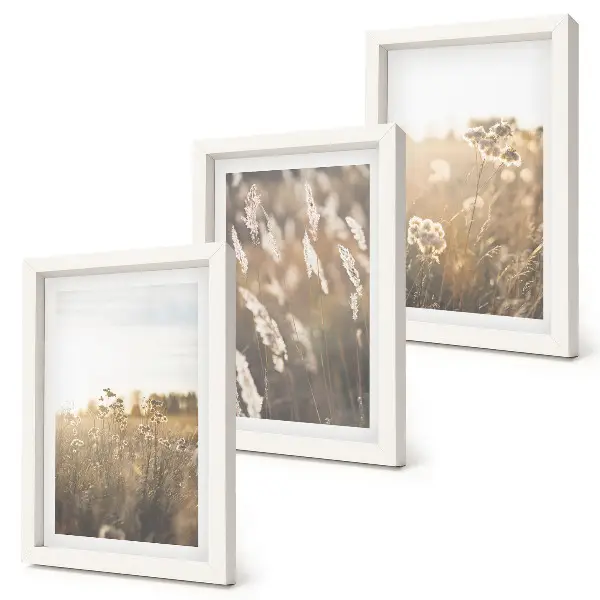 Gallery wall landschap met grassen en bloemen in warme tinten