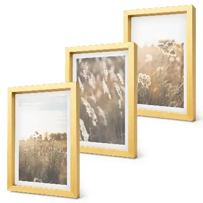 Gallery wall landschap met grassen en bloemen in warme tinten