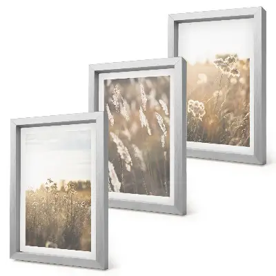 Gallery wall landschap met grassen en bloemen in warme tinten