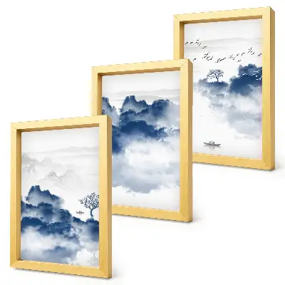 Set van ingelijste schilderijen met wolkenbergen, bomen en vogels op de achtergrond