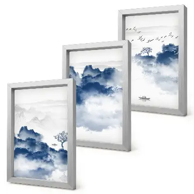 Set van ingelijste schilderijen met wolkenbergen, bomen en vogels op de achtergrond