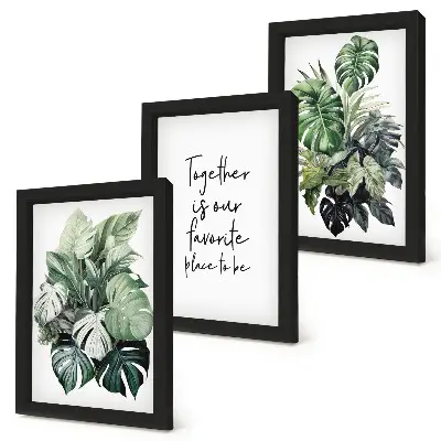 Set van ingelijste schilderijen met tropische groene bladeren en decoratieve inscriptie