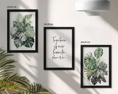 Set van ingelijste schilderijen met tropische groene bladeren en decoratieve inscriptie