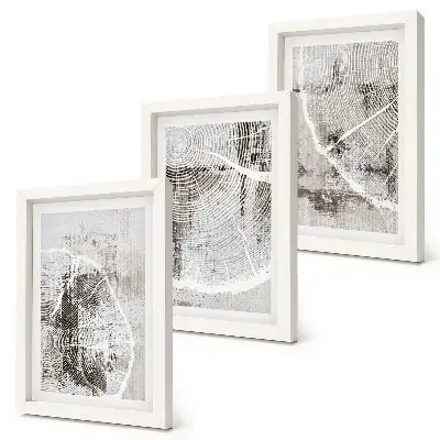 Gallery wall met houtnerfpatronen in grijstinten en wit