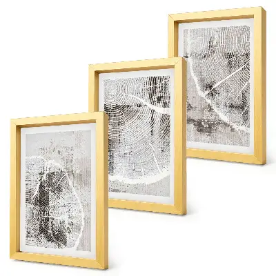 Gallery wall met houtnerfpatronen in grijstinten en wit