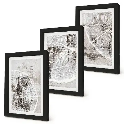 Gallery wall met houtnerfpatronen in grijstinten en wit