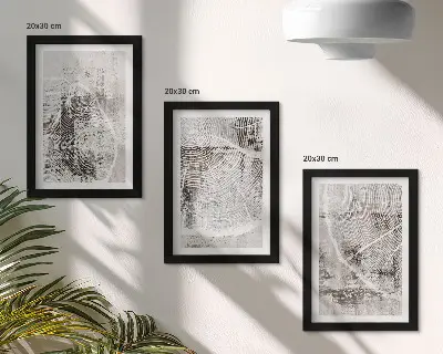 Gallery wall met houtnerfpatronen in grijstinten en wit