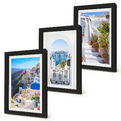 Set van ingelijste schilderijen met uitzichten op Santorini en de Griekse architectuur van Oia