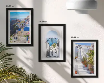 Set van ingelijste schilderijen met uitzichten op Santorini en de Griekse architectuur van Oia