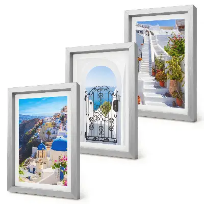 Set van ingelijste schilderijen met uitzichten op Santorini en de Griekse architectuur van Oia