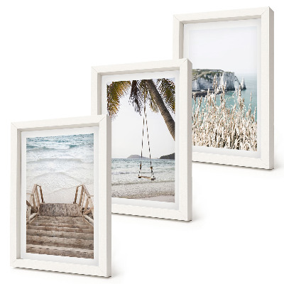 Gallery wall Strand met houten trap en een schommel aan zee
