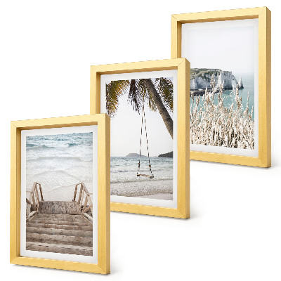 Gallery wall Strand met houten trap en een schommel aan zee