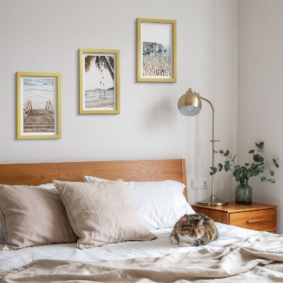 Gallery wall Strand met houten trap en een schommel aan zee