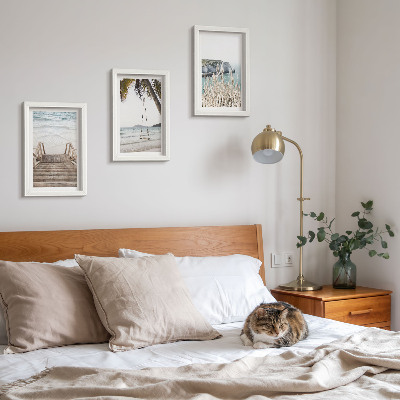 Gallery wall Strand met houten trap en een schommel aan zee