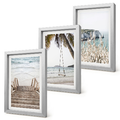 Gallery wall Strand met houten trap en een schommel aan zee