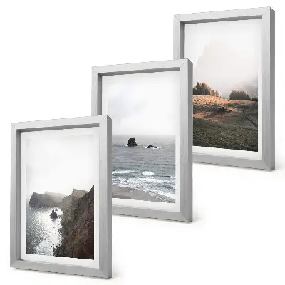 Set van ingelijste schilderijen met berg- en zeelandschappen vol wolken en bossen