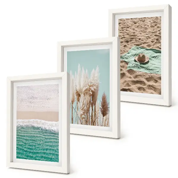 Set van ingelijste schilderijen met strand, gras, hoed en zand voor een natuurlijke ontspanning
