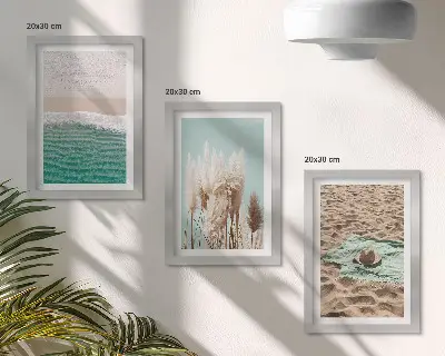 Set van ingelijste schilderijen met strand, gras, hoed en zand voor een natuurlijke ontspanning