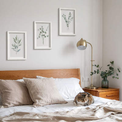 Gallery wall Plantenpatronen in groene en grijze tinten.