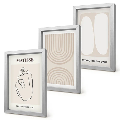 Set van ingelijste schilderijen met stijlvolle lijnen en minimalistische vormen in neutrale tinten