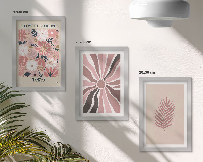 Gallery wall Bloemmotieven met bladeren en geometrische vormen.
