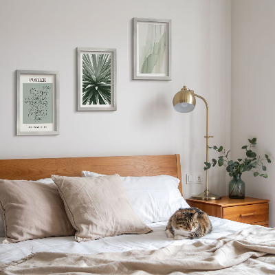 Set van ingelijste schilderijen Plantenpatronen in tinten groen en beige.
