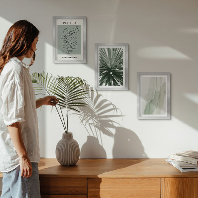 Set van ingelijste schilderijen Plantenpatronen in tinten groen en beige.