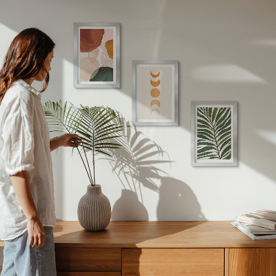 Set van ingelijste schilderijen Abstracte vormen in warme kleuren en bladeren