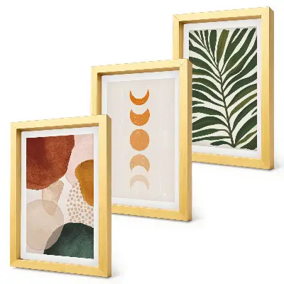 Set ingelijste schilderijen met abstracte vormen in warme kleuren en bladeren