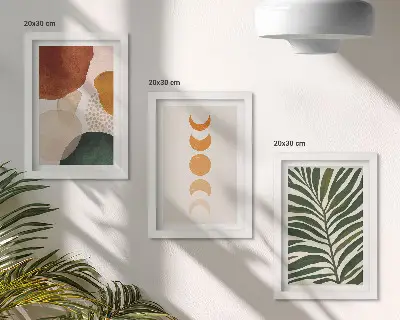 Set ingelijste schilderijen met abstracte vormen in warme kleuren en bladeren