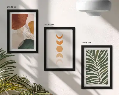 Set ingelijste schilderijen met abstracte vormen in warme kleuren en bladeren